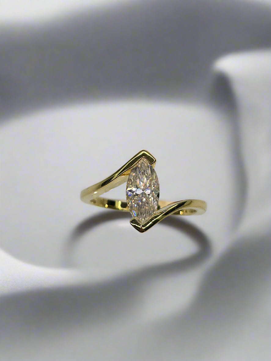 Unique Solitaire Engagement Ring