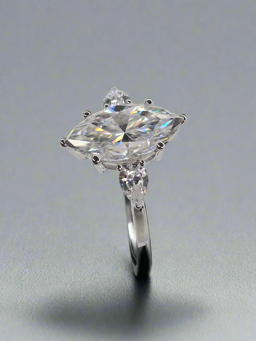 Three Stone Marquise Engagement Ring