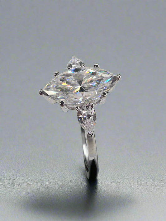 Three Stone Marquise Engagement Ring