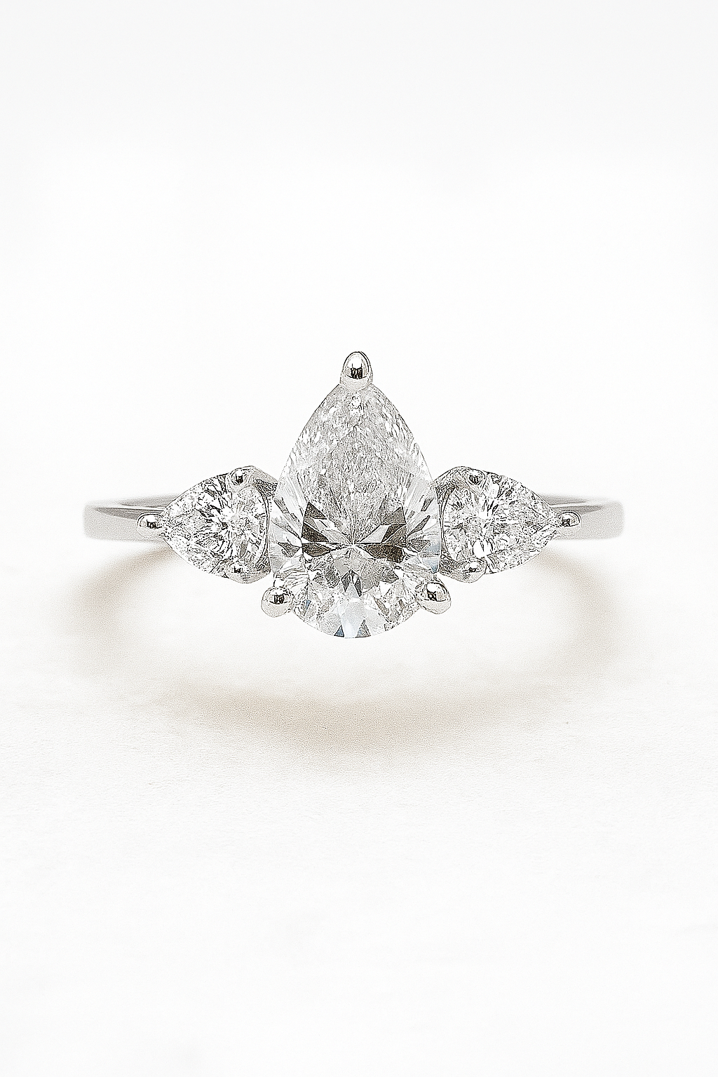 Three Stone Pear Engagement Ring
