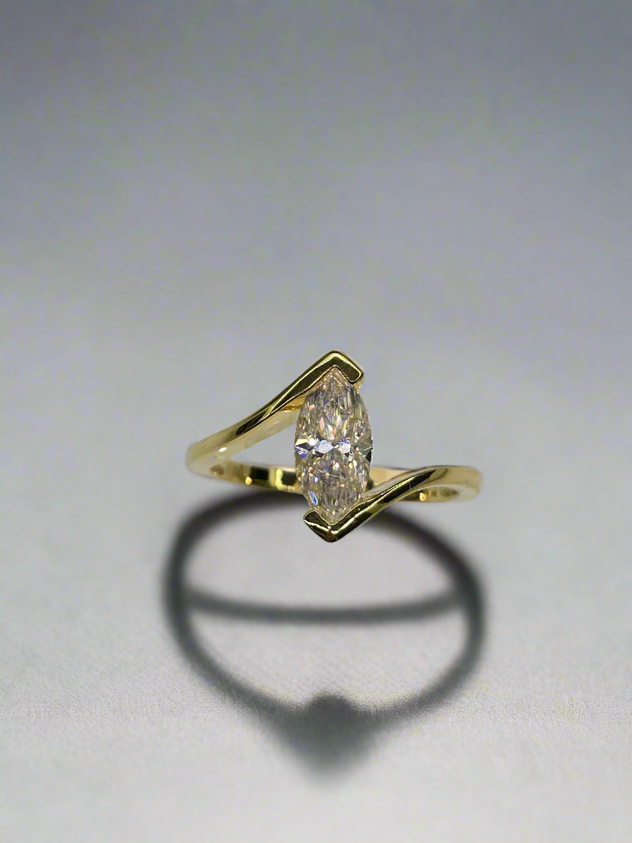 Unique Solitaire Engagement Ring