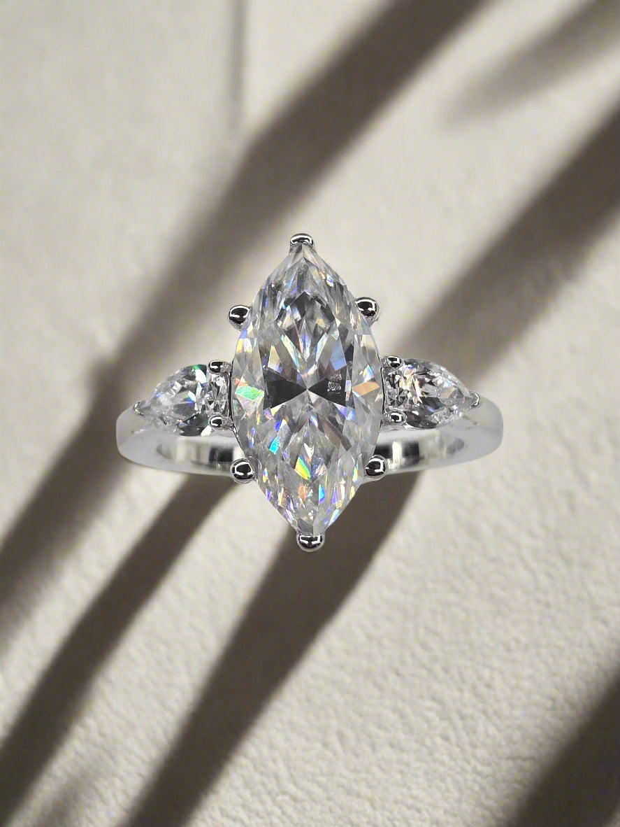 Three Stone Marquise Engagement Ring