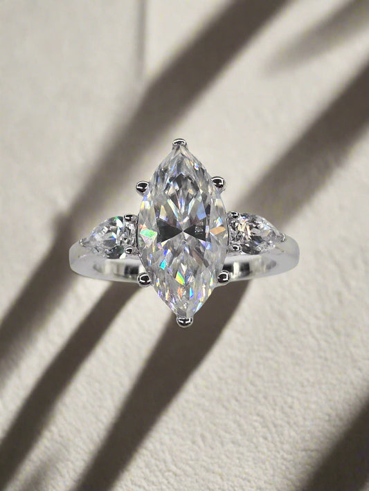 Three Stone Marquise Engagement Ring