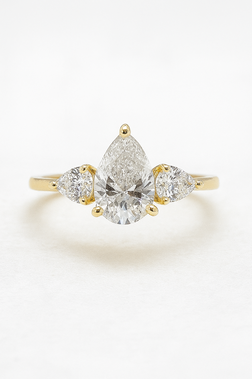 Three Stone Pear Engagement Ring